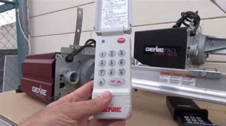 How do I program my overhead garage door opener remote?