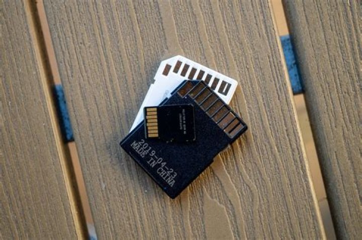 How do I remove the SD card from my tablet?