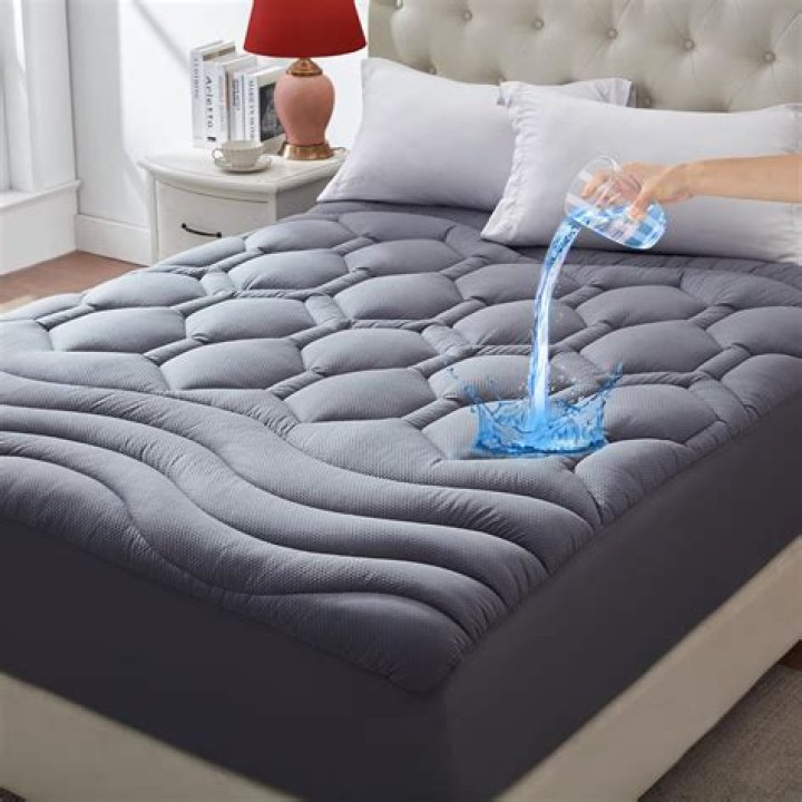 What does a mattress cover do?