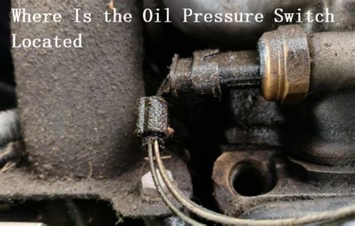Where is oil pressure switch located?